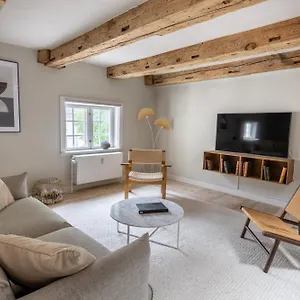 Apartment With Exposed Ceiling Beams Copenhagen